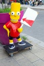 Bart Simpson mascot on skateboard