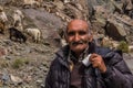 BARTANG, TAJIKISTAN - MAY 20, 2018: Sheep and goat herder in Bartang valley in Pamir mountains, Tajikist