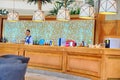 The bartender at the bar in the Arab cafe. Arabic restaurant in a hotel in the middle East. Luxury hotel lobby bar interior -