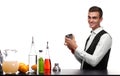 A bartender cleaning a shaker for beverages, isolated on a white background. Cocktail ingredients on a bar counter.