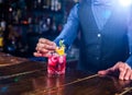 Barman concocts a cocktail on the beerhall