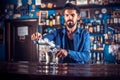 Barman concocts a cocktail on the public house