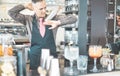 Bartender doing flair inside american cocktail bar - Barman at work performing freestyle show - Focus on man hand shaker - Work, Royalty Free Stock Photo