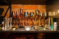 Bartender equipment as different metal color jiggers, glasses and strainer spoon