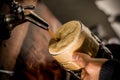 Bartender filling up with a blonde craft beer into a pint glass Royalty Free Stock Photo