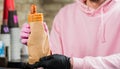 Bartender holding french hot dog Royalty Free Stock Photo