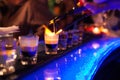 The bartender makes hot alcoholic cocktail and ignites bar. elite night club during party prepares a fiery cocktail