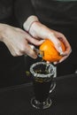 Bartender is making cocktail at bar counter at night club