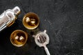 Bartender making cocktail with whiskey the bar counter black background top view copyspace Royalty Free Stock Photo