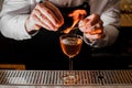 Bartender making a fresh cocktail with a smoky note Royalty Free Stock Photo