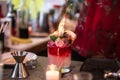 Bartender making Fresh tropical alcohol cocktails with fire on the bar counter. Royalty Free Stock Photo