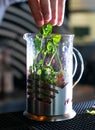 Bartender making herbal tea