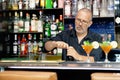 The waitress opens a bottle of white wine Royalty Free Stock Photo