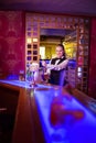 Bartender pouring beer in glass Royalty Free Stock Photo