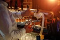 Bartender pouring draft beer from the crane into the glass in pub Royalty Free Stock Photo