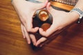 Bartender pouring strong alcoholic drink into small glasses on bar, shots. Royalty Free Stock Photo