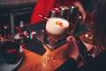 Bartender pouring using strainer Sweet pink healthy Cocktail drink on a bar counter . Bartender view . Trendy stylish white. Copy