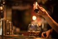 Bartender pouring whisky in a glass Royalty Free Stock Photo