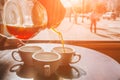 Bartender pours coffee to cups Royalty Free Stock Photo