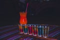 The bartender prepares cocktails. Multi-colored cocktail. Refreshing cocktails. rainbow cocktails. rainbow cocktail in vintage