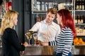 Bartender Serving Wine To Customers In Bar Royalty Free Stock Photo