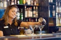 Bartender woman hold a professional shaker Royalty Free Stock Photo