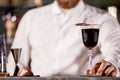 Bartenderpresenting coffe cocktail in lounge bar Royalty Free Stock Photo