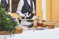 Bartenders are serving drinks at wedding reception in Tuscany. Royalty Free Stock Photo