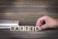 Barter concept. Wooden letters on the office desk