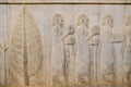 A bas-relief of ancient Greeks at Apadana, Persepolis. Shiraz, Iran. Royalty Free Stock Photo