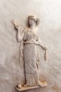 Bas relief of Atropos cutting the thread of life Royalty Free Stock Photo