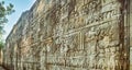 Bas-relief at Bayon temple in Angkor Thom. Siem Reap. Cambodia. Panorama Royalty Free Stock Photo