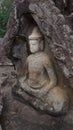 Bas relief of the Buddha sculpture on the natural stone at Phu Phra Bat is a historical park Royalty Free Stock Photo