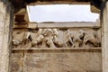 Bas relief carvings between columns