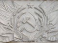 Bas-relief depicting the hammer and sickle of the USSR coat of arms