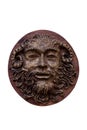 Bas-relief Faunus of the Greek deity made on wood isolated on w