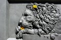 Bas-relief of a lion. lion in architecture.Element of the monument design in Poltava, Ukraine