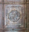 Bas-relief with scenes from the Bible on the massive decorated front door at the entrance to Tabgha - Catholic Church Multiplicat