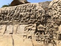 Bas relief rock cut sculptures of Gods, people and animals carved in monolithic rock Royalty Free Stock Photo