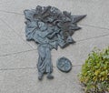 Bas-relief on the theme of medicine at the entrance to the building of the Institute of Urology in Kyiv