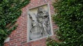 Bas-relief of the Virgin Mary and Child on the gate of a Gothic castle Malbork in Poland Royalty Free Stock Photo