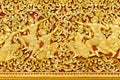 The bas-relief on the wall of the temple in Louangphabang, Laos. Close-up. Royalty Free Stock Photo