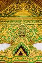 The bas-relief on the wall of the temple in Louangphabang, Laos. Close-up. Vertical. Royalty Free Stock Photo