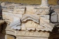 Bas-reliefs of antique scenes on the gables of the amphitheater in Hierapolis, Turkey