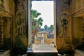 The bas-reliefs of apsara dancers have been preserved on the stone walls of the ancient temple.