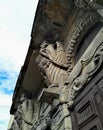 Bas-reliefs and facades of houses. Look from below.