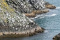 Basalt cliffs along the rugged shoreline of Arnarstapi Iceland