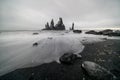 Basalt rock formations Troll toes on black beach. at storm Reynisdrangar, Vik, Iceland Royalty Free Stock Photo