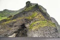 Basalt stone columns and black sand beach, Reynisfjara, Iceland Royalty Free Stock Photo