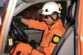 A Basarnas rescue team communicating in a car